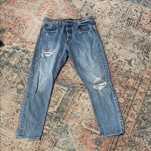 Levi's Blue High Rise Jeans with Distressed Details